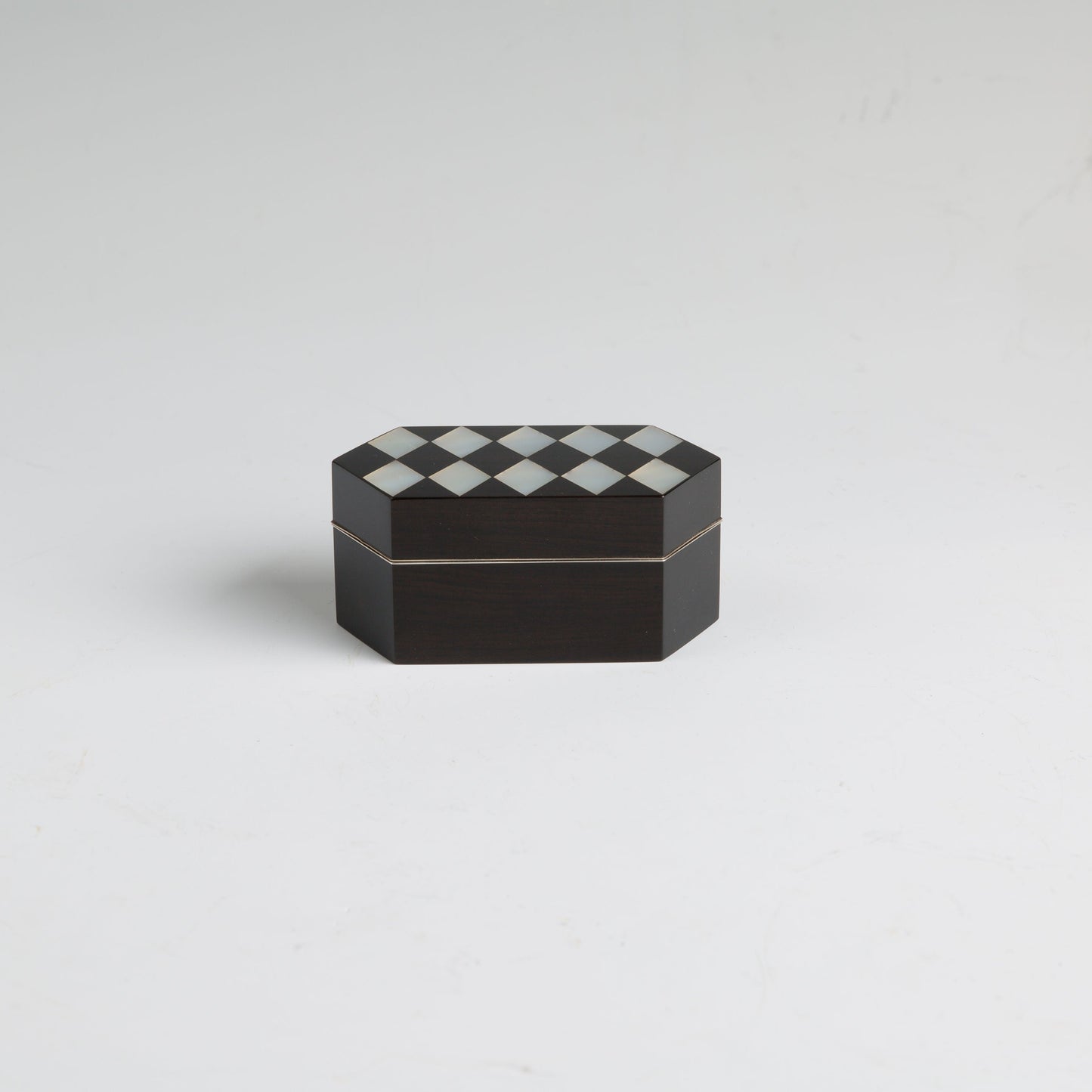 Luxury hexagonal ebony Japanese incense container with geometric raden inlay by Inami Hiroyuki made with Lacquer and Mother-of-pearl inlay