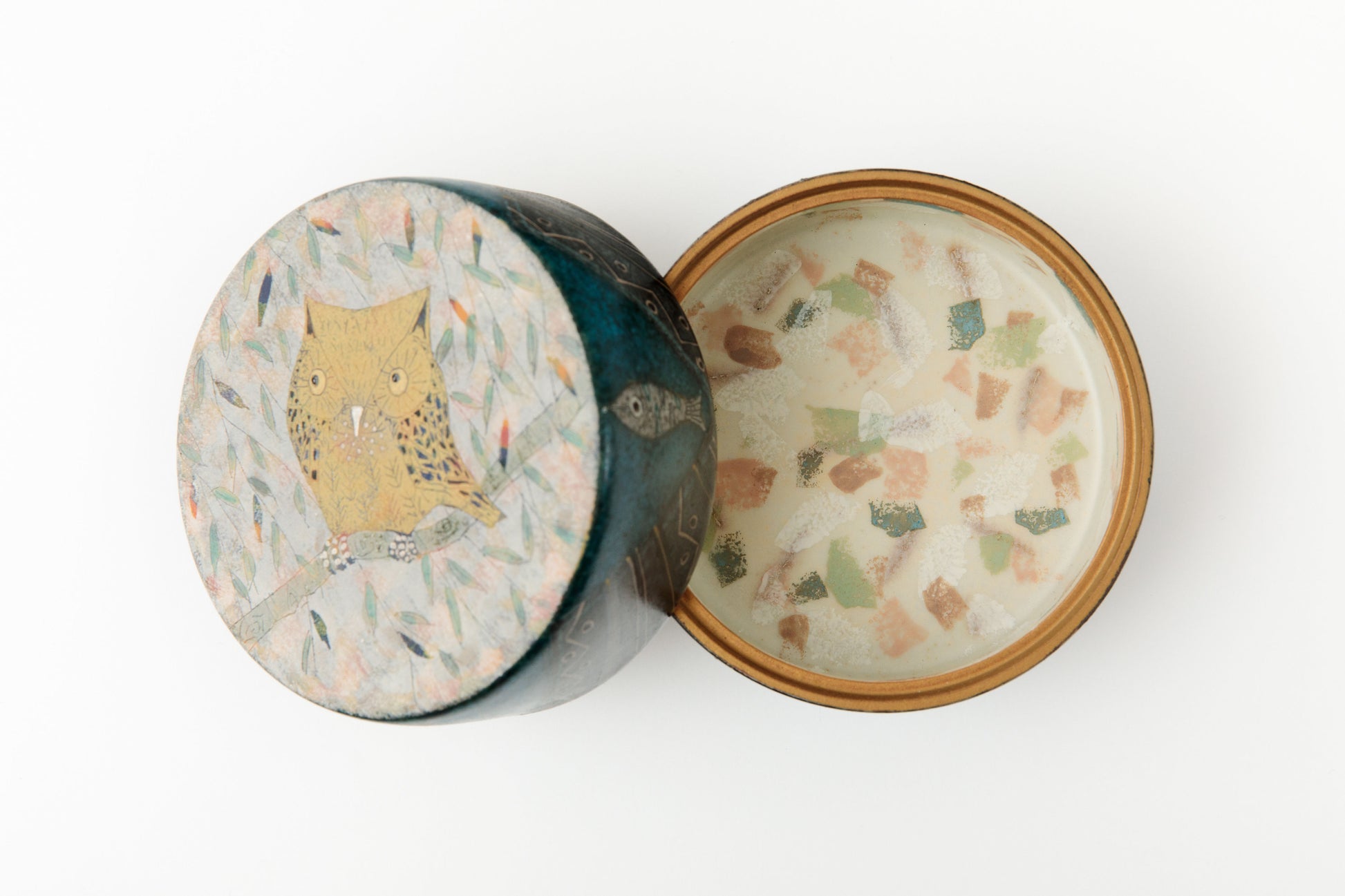 Top view of open japanese ceramic box by Ito Hokuto with decorated lid and glazed interior | wanova