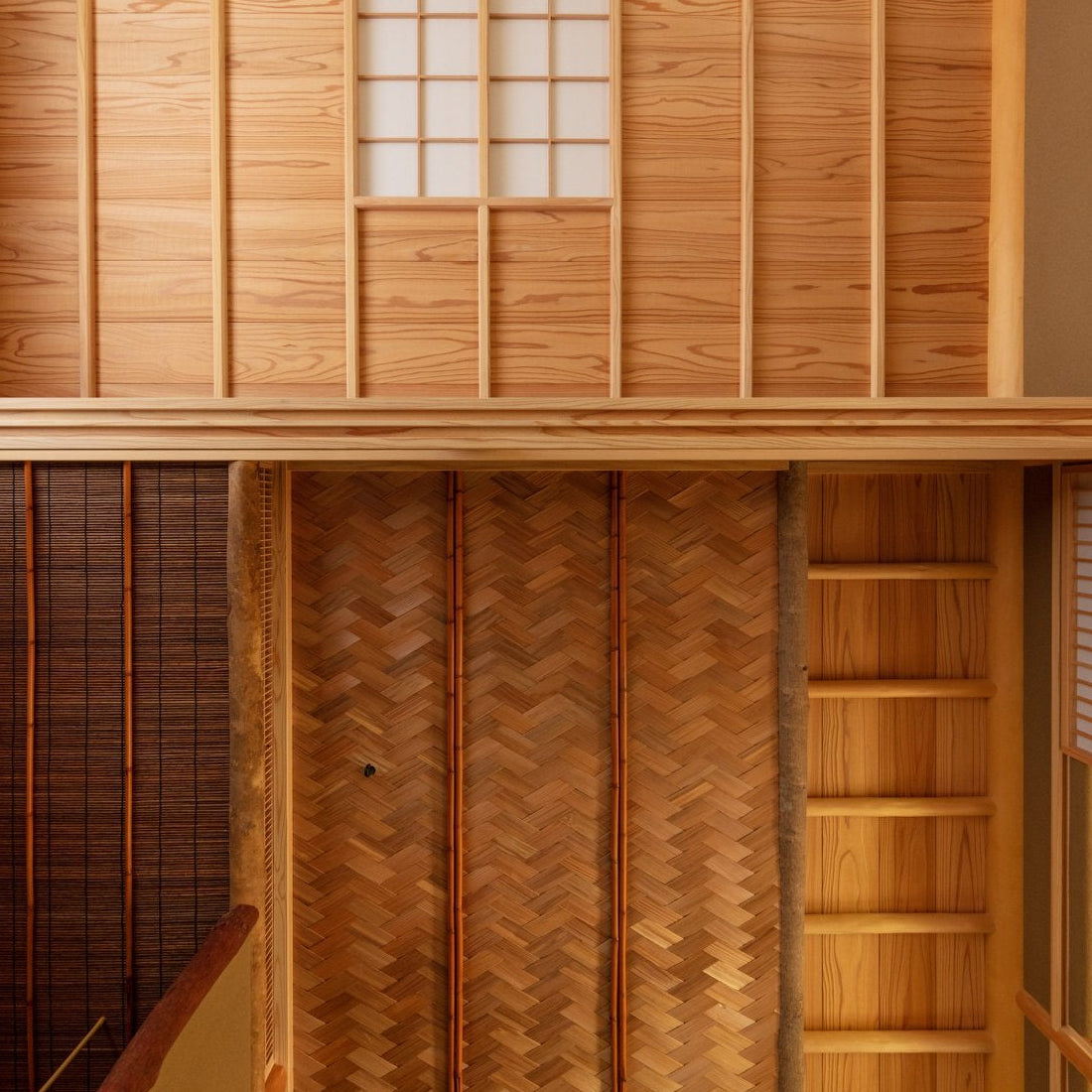 Detail of woven bamboo herringbone walls, a kumiko window and cedar boards, craftsmanship of Japanese tea house architecture.