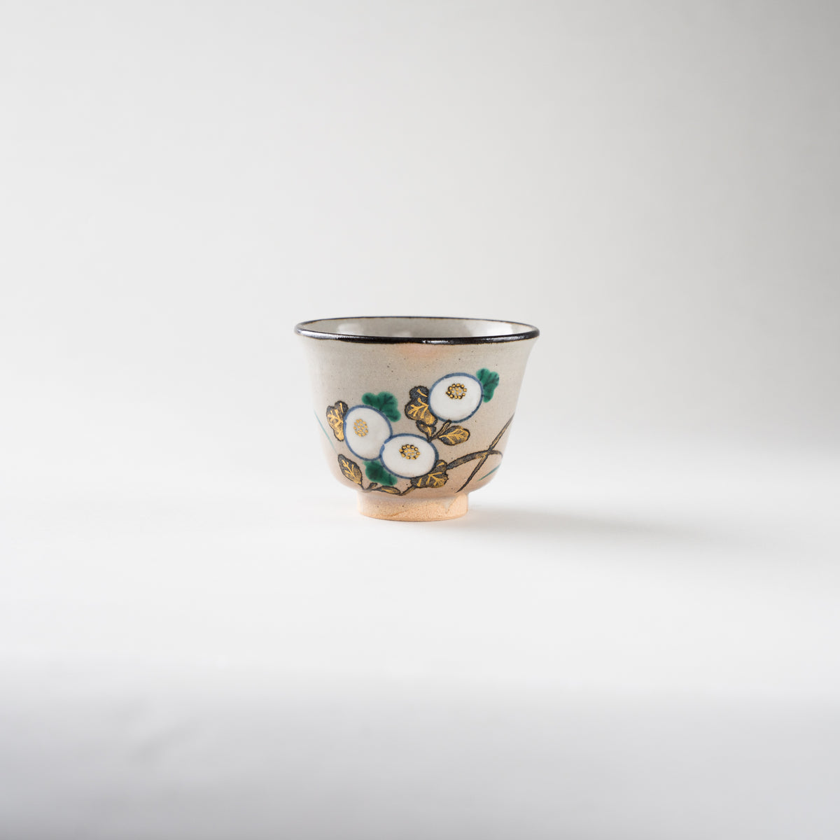 Low-angle profile of the Kiku GUINOMI sake cup by Eiraku Zengoro XVI against a clean background, emphasizing its classic bell-shaped silhouette.