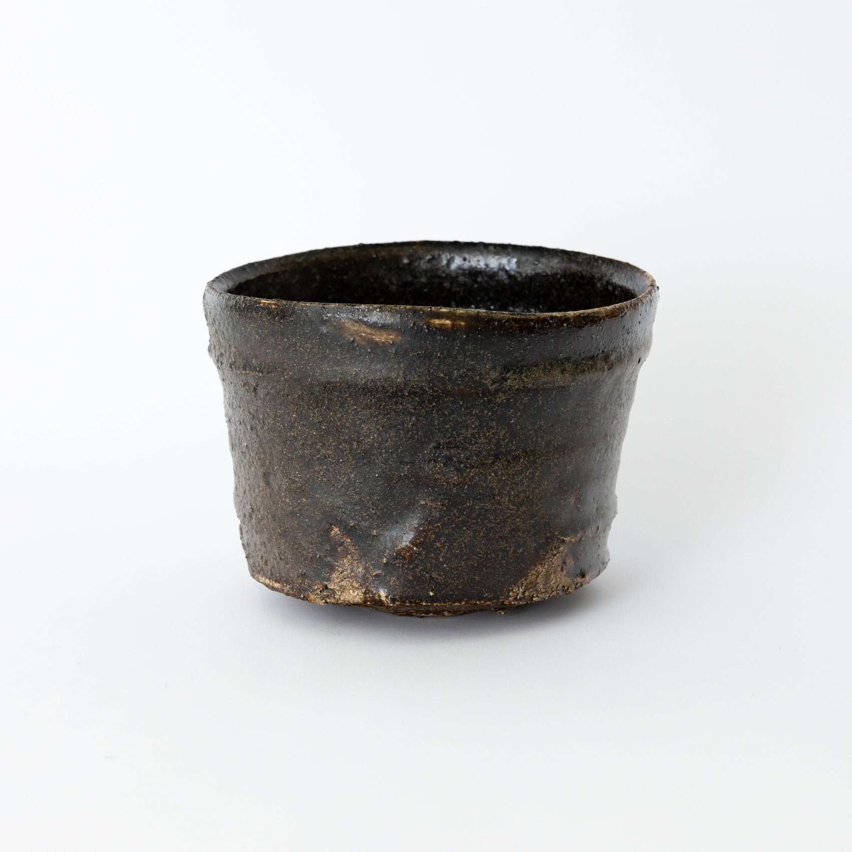 Alternate view of an Oribe Chawan tea bowl by Kai Tsujimura, showing its quiet irregular contour and firing character.