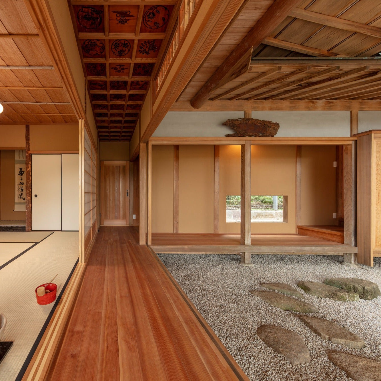Tea pavilion wing with a hanging scroll, utensils and a round paper lantern along the corridor