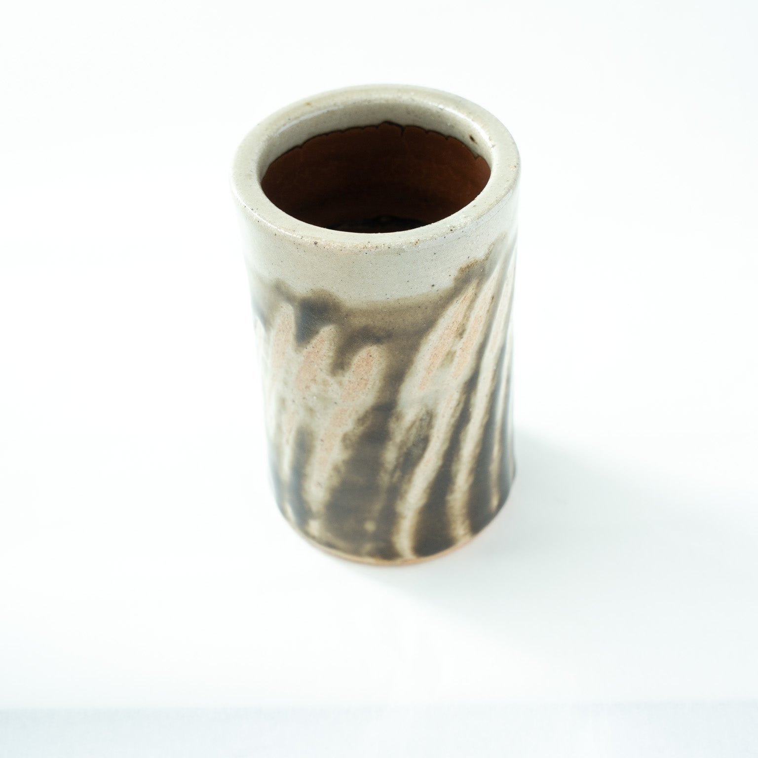 Top view of the Mashiko vase, emphasizing the circular opening and the solid, heavy presence of the ceramic wall.