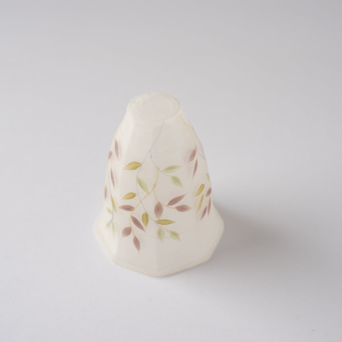 Inverted view showing the small flat base and bell-shaped silhouette of Toru Sato’s frosted glass GUINOMI.