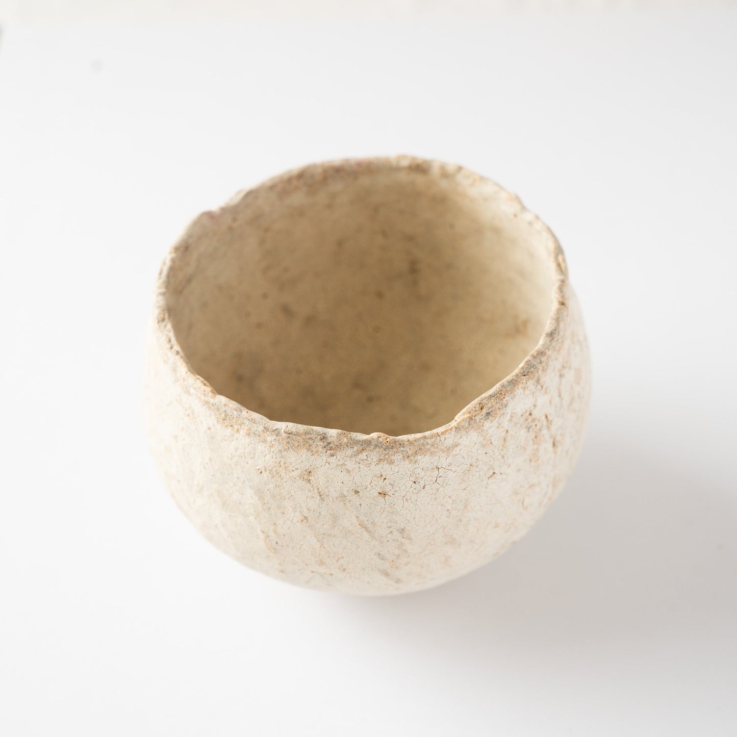 Three-quarter top view of the Bao small CHAWAN by Wataru Myosyu, highlighting the soft enclosure of space.