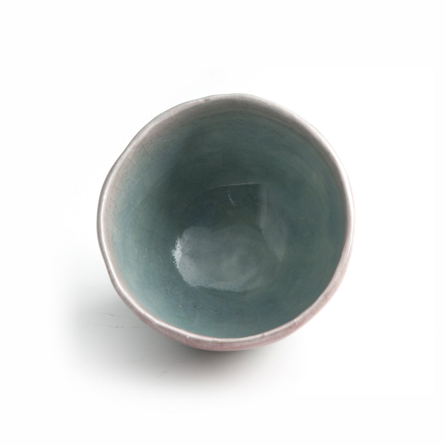 Top view of Musubi ceramic tea bowl by Yasushi Fujihira showing celadon interior glaze