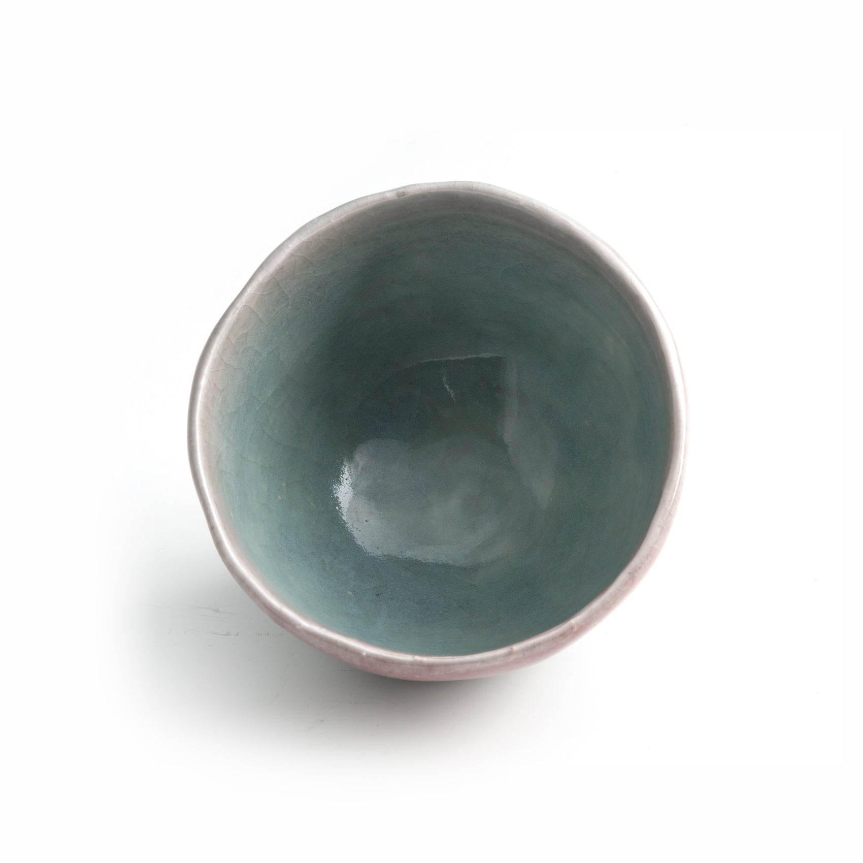 Top view of Musubi ceramic tea bowl by Yasushi Fujihira showing celadon interior glaze