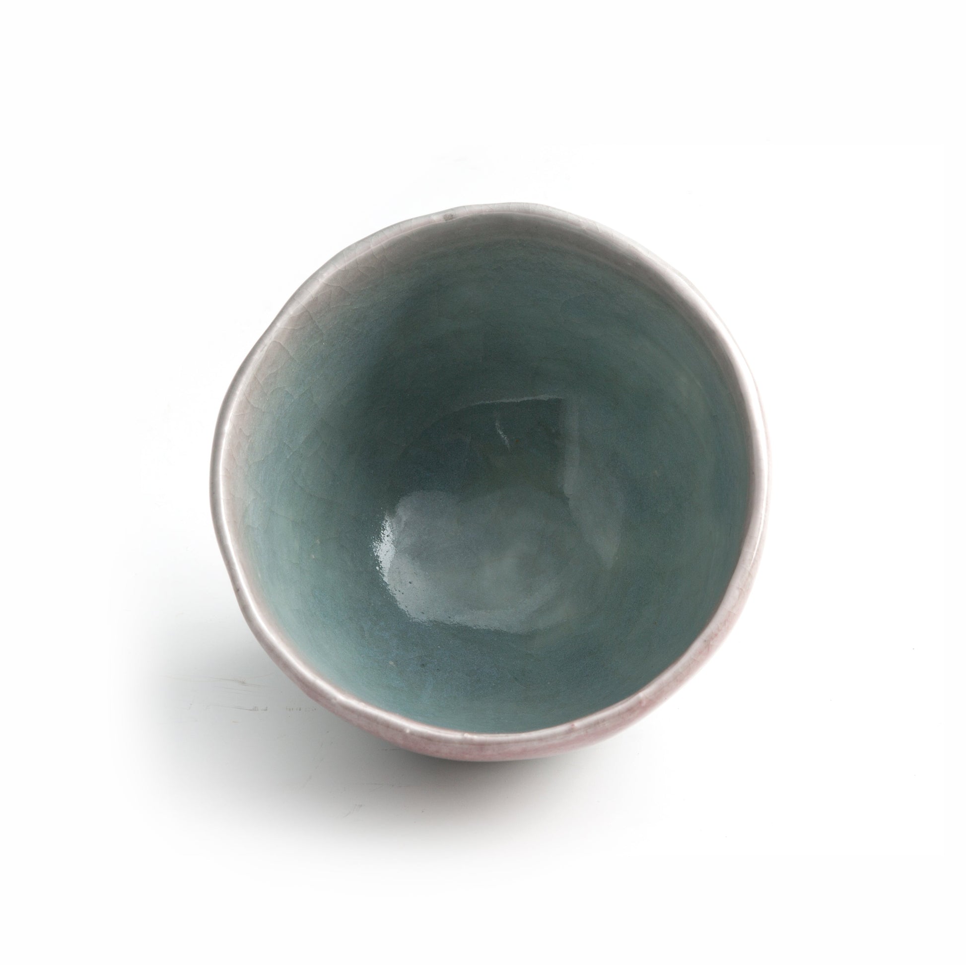 Top view of Musubi ceramic tea bowl by Yasushi Fujihira showing celadon interior glaze