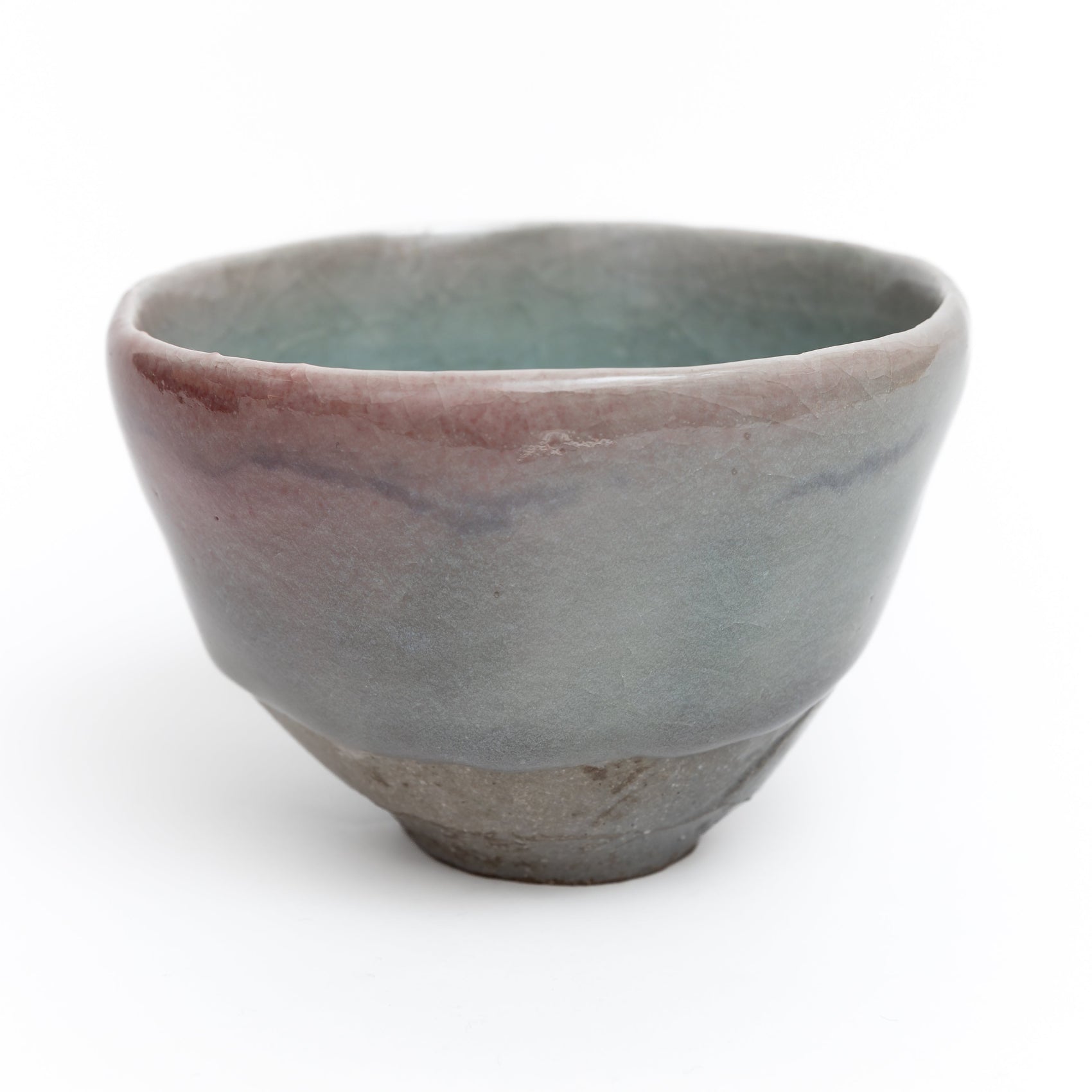Musubi tea bowl exterior with soft rose and celadon glaze by Yasushi Fujihira